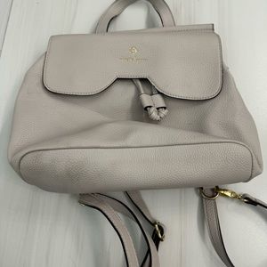 dusty pink bag that can be a purse or backpack.